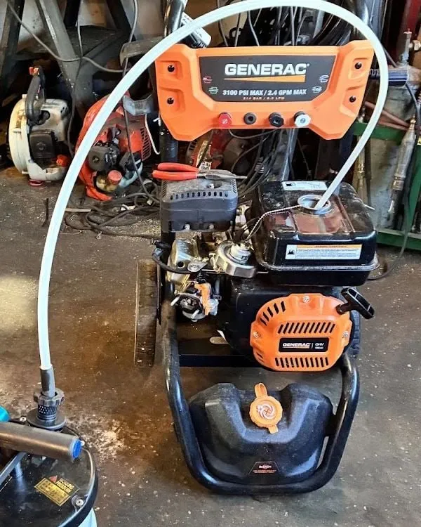 Generac 3100 PSI gas pressure washer during an oil change