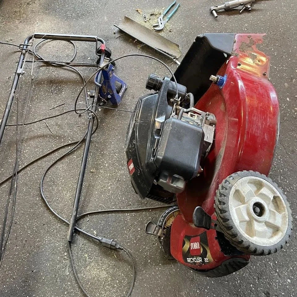 Toro Recycler lawn mower stripped down for service